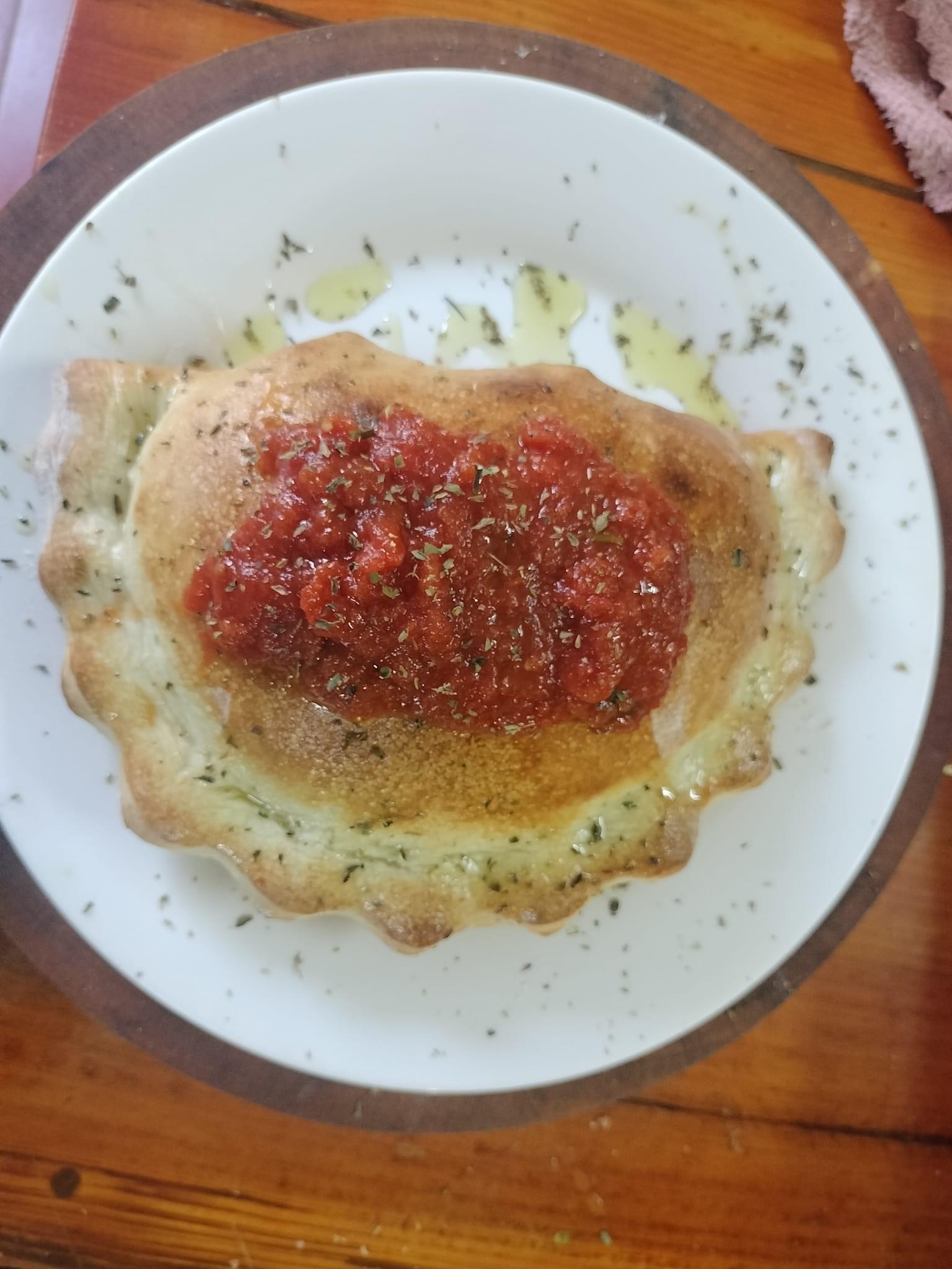 CALZONE di VEGA. STUFFED WITH FRESH MUSHROOMS, CHEESE, BELL PEPPERS & ONIONS